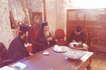 H.B. with F. Isidoros & specialists at the office of the Church of Resurrection