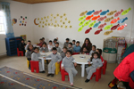 The classroom of the Kindergarten, with the little students during their lesson