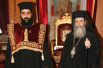 Ο Μακαριώτατος &  ο π. Αθανάσιος, φέρων την δαλματική στολή -μπροστά.