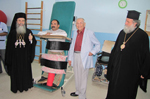H.B. & Dr. Tleel visiting a heart patient treated with specialized equipment 