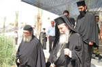 The descend of His Beatitude with Arch. Chrysostomos to the river side